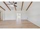 Spacious living room with laminate floors and ceiling fan at 4360 Se 58Th Pl, Ocala, FL 34480