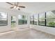 Well lit living room with large windows and back yard access at 4360 Se 58Th Pl, Ocala, FL 34480
