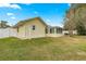 Spacious backyard with lush green grass and plenty of privacy at 4219 Ne 33Rd Ave, Ocala, FL 34479