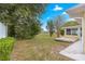 Spacious backyard area with a wooden deck, perfect for outdoor relaxation and entertainment at 4219 Ne 33Rd Ave, Ocala, FL 34479