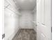 Spacious walk-in closet with metal shelving at 4219 Ne 33Rd Ave, Ocala, FL 34479