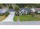 Charming single-story home features a well-manicured lawn, a paved driveway, and an attached garage at 8150 Sw 108Th St, Ocala, FL 34481