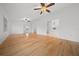 Light-filled living room with hardwood floors and seamlessly connects to other rooms at 8150 Sw 108Th St, Ocala, FL 34481