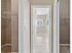 Bright walk-in closet with wire shelving offers ample storage space for an organized wardrobe at 10927 Se 168Th Loop, Summerfield, FL 34491