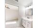 Clean bathroom with white vanity, a sink and a view to bedroom at 11 Emerald Trl, Ocala, FL 34472
