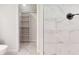 Bathroom with toilet and a view to closet and shower at 11 Emerald Trl, Ocala, FL 34472