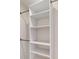 Spacious closet with shelving and hanging rods for ample storage at 11 Emerald Trl, Ocala, FL 34472