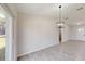 Bright dining room with wood-look tile floors and access to backyard at 11 Emerald Trl, Ocala, FL 34472