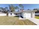Newly constructed home with a modern facade and attached garage at 11 Emerald Trl, Ocala, FL 34472