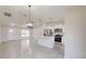 Modern kitchen with stainless steel appliances and an island at 11 Emerald Trl, Ocala, FL 34472