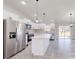 Modern kitchen featuring stainless steel appliances and an island at 11 Emerald Trl, Ocala, FL 34472