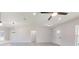 Open living room featuring tile floors and high ceilings at 11 Emerald Trl, Ocala, FL 34472
