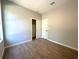 Bedroom with closet and wood-look tile flooring at 14711 Sw 69Th Court Rd, Ocala, FL 34473