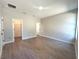 Spacious bedroom featuring tile floors, closet, and neutral paint, ready for personalization at 14711 Sw 69Th Court Rd, Ocala, FL 34473