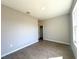 Bedroom with wood-look tile flooring and a window at 14711 Sw 69Th Court Rd, Ocala, FL 34473