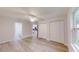 Bedroom featuring hard wood floors and large closets with access to the bathroom and kitchen at 21114 Sw Peach Blossom St, Dunnellon, FL 34431