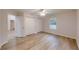 Bright bedroom with wood floors, a ceiling fan, and double closets for ample storage space at 21114 Sw Peach Blossom St, Dunnellon, FL 34431