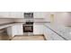 Corner view of kitchen showing granite countertops and stainless steel appliances at 21114 Sw Peach Blossom St, Dunnellon, FL 34431