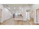 Open-concept living area that combines the living room with the stainless-steel kitchen at 21114 Sw Peach Blossom St, Dunnellon, FL 34431