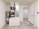 Utility room features water heater, furnace, and access to the rest of the home at 21114 Sw Peach Blossom St, Dunnellon, FL 34431