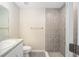 Clean bathroom with a shower and white vanity at 22084 Sw Rainbow Lakes Blvd, Dunnellon, FL 34431