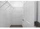 Spacious closet with wire shelving and hanging rods at 22084 Sw Rainbow Lakes Blvd, Dunnellon, FL 34431