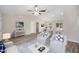 Spacious living room with vaulted ceilings and stylish furniture at 22084 Sw Rainbow Lakes Blvd, Dunnellon, FL 34431