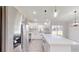 Modern kitchen with stainless steel appliances and island at 227 Oak Lane Cir, Ocala, FL 34472