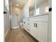 Bathroom featuring double vanity, a walk-in glass shower and tile floor at 3015 Sw 132Nd St, Ocala, FL 34473