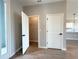 A view of the coat closet in the foyer featuring wire shelving and standard closet doors at 3015 Sw 132Nd St, Ocala, FL 34473