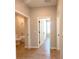 Hallway view showcasing the bathroom and bedroom access at 3015 Sw 132Nd St, Ocala, FL 34473