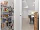 Well-organized pantry with ample shelving for food storage at 6200 Sw 72Nd Ter, Ocala, FL 34474