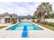 Refreshing rectangular pool in backyard at 812 Se 23Rd St, Ocala, FL 34471