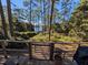 Scenic backyard view from the deck, offering privacy and natural surroundings at 14830 Se 61St Street Rd, Ocklawaha, FL 32179