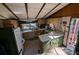Charming kitchen featuring wood cabinetry and an island, perfect for Gathering meals at 14830 Se 61St Street Rd, Ocklawaha, FL 32179