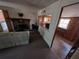 Comfortable living room featuring fireplace and views to another living space at 14830 Se 61St Street Rd, Ocklawaha, FL 32179