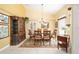 Dining area with elegant chandelier and classic furniture at 19009 Sw 98Th Loop, Dunnellon, FL 34432