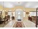 Grand foyer with tile flooring and ornate glass door at 19009 Sw 98Th Loop, Dunnellon, FL 34432