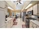 Spacious kitchen featuring modern appliances and an open design connecting to the dining area at 19009 Sw 98Th Loop, Dunnellon, FL 34432