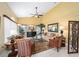 Bright living room showcasing high ceilings and comfortable seating arrangements at 19009 Sw 98Th Loop, Dunnellon, FL 34432