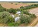 Aerial view of a home on a large lot with multiple outbuildings at 21500 Sw 33Rd St, Dunnellon, FL 34431