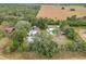 Aerial view showing a home with several surrounding structures and large property at 21500 Sw 33Rd St, Dunnellon, FL 34431