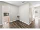 Hallway entrance with dark wood flooring and natural light illuminating the space at 2605 Ne 14Th Ave, Ocala, FL 34470