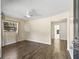 Inviting living room with stylish flooring and a modern ceiling fan at 2605 Ne 14Th Ave, Ocala, FL 34470