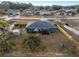 Aerial view of house, backyard, and shed in residential area at 35 Teak Rd, Ocala, FL 34472