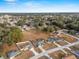 Aerial view of residential neighborhood with a large lot available at 35 Teak Rd, Ocala, FL 34472