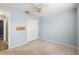 Bright bedroom with ceiling fan and neutral decor at 35 Teak Rd, Ocala, FL 34472