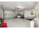 Garage interior with storage shelving and some tools and equipment at 35 Teak Rd, Ocala, FL 34472