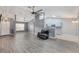 Spacious living room with grey walls and wood-look flooring at 35 Teak Rd, Ocala, FL 34472