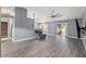 Living room featuring hardwood floors and a ceiling fan at 35 Teak Rd, Ocala, FL 34472